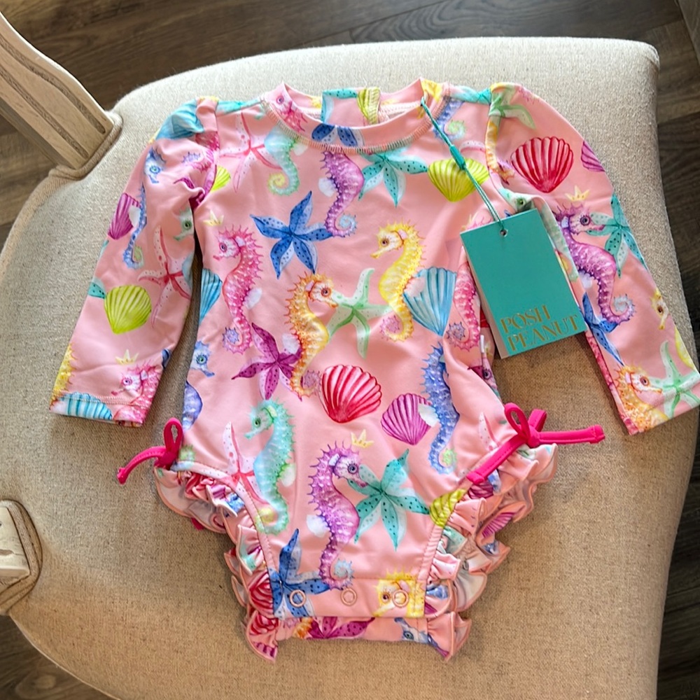 Posh Peanut Coral Long Sleeve Ruffled Rash Guard Swimsuit. NWT.